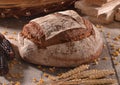 Loaf of integral bread on rural rustic ambient