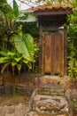 Traditional local road house. Entrance door. Kuching, Borneo, Sarawak, Malaysia Royalty Free Stock Photo