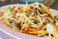 Traditional local Thai food papaya salad with pickled fish sauce