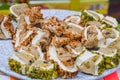 Traditional `lokum rolls` a sweet dessert turkish delights, pastry with different flavours and fillings: pistachios, walnut. Fre Royalty Free Stock Photo