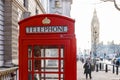 Traditional London red phone box and Big ben in early morning Royalty Free Stock Photo