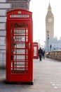 Traditional London red phone box and Big ben in early morning Royalty Free Stock Photo