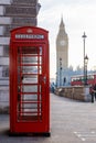 Traditional London red phone box and Big ben in early morning Royalty Free Stock Photo