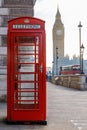 Traditional London red phone box and Big ben in early morning