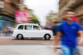 Traditional London Taxi Cab in motion blur