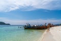 Traditional long tail boats in crystal clear water in Sai Khao Beach, Ra Wi Island, Southern of Thailand