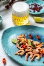 Traditional Low Country boil. Grilled shrimps or prawns served with lime. Seafood. Summertime feast Royalty Free Stock Photo