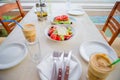 Traditional lunch with delicious fresh greek salad and brusketa served for lunch at outdoor restaurant with beautiful Royalty Free Stock Photo