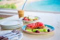 Traditional lunch with delicious fresh greek salad, frappe and brusketa served for lunch at outdoor cafe Royalty Free Stock Photo