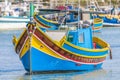 Traditional Luzzu boat at Marsaxlokk harbor in Malta. Royalty Free Stock Photo