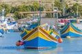 Traditional Luzzu boat at Marsaxlokk harbor in Malta. Royalty Free Stock Photo