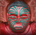 The cropped shot view of the traditional Maori wood carving style. Royalty Free Stock Photo