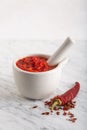 Traditional Maghrebi hot chili pepper sauce paste harissa. Tunisia and Arabic