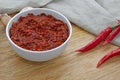 Traditional Maghrebi hot chili pepper sauce paste harissa. Tunisia and Arabic cuisine adjika