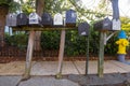 Traditional mailboxes on wooden posts