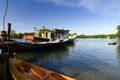 Traditional malaysian fisherman boat moored near the riverbank, Royalty Free Stock Photo