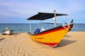 fisherman boat on sandy beach Royalty Free Stock Photo