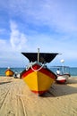 Traditional Malaysian fisherman boat on sandy beach Royalty Free Stock Photo