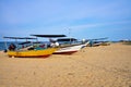 Traditional Malaysian fisherman boat on sandy beach Royalty Free Stock Photo