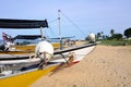 Traditional Malaysian fisherman boat on sandy beach Royalty Free Stock Photo