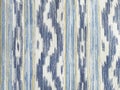 Traditional Mallorcan fabric texture with a pattern in the shape of blue and white tongues. Cushion fabric background made with