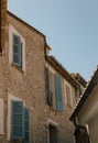 Traditional Mallorcan house with thick wooden door. Typical stone house of the Mediterranean. Holiday home to spend the summer in