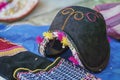 Traditional man`s hat and weavings laid out on the local sunday market of Tarabuco, Bolivia Royalty Free Stock Photo