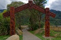 Traditional Maori carvings at the entrance to New Zealand`s Abel Tasman National Park