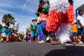 Traditional masqueraders make a presentation playing percussion instruments during the Fuzue parade Royalty Free Stock Photo