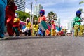 Traditional masqueraders make a presentation playing percussion Royalty Free Stock Photo