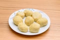 Traditional matzoh ball kneidlach for soup.White platel with authentic matzo ball tradition Jewish food for Passover .