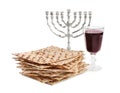 Traditional matzos, red wine and menorah on white background Royalty Free Stock Photo