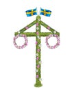 Traditional maypole for midsummer celebration in Sweden