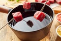 Traditional meat fondue with diced raw beef Royalty Free Stock Photo