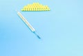 Traditional Medical thermometer and yellow pills Royalty Free Stock Photo