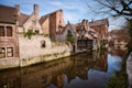 Traditional medieval houses on a canal in historical Bruges Old Town center, Belgium Royalty Free Stock Photo