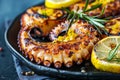 Traditional mediterranean cuisine grilled octopus served on elegant black plate