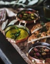 Traditional Mediterranean meze appetizers platter on wooden board