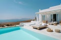 Traditional mediterranean white house with pool on hill with stunning sea view. Summer vacation background. Created with Royalty Free Stock Photo
