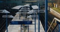 Traditional metallic lamp posts around a railway station