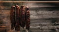 Traditional method of smoking meat in smoke. Smoked ham, bacon, pork neck and sausages in a smokehouse