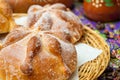 Traditional Mexican bread of the dead pan de muerto with coffe