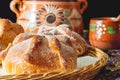 Traditional Mexican bread of the dead pan de muerto with coffe