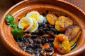 Traditional Mexican and Central American breakfast. Black beans and plantain