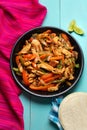 Mexican chicken fajitas on turquoise background Royalty Free Stock Photo