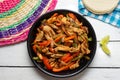 Mexican chicken fajitas on white background Royalty Free Stock Photo