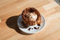 Traditional Mexican dessert churros served with ice cream on white plate on wooden table Royalty Free Stock Photo