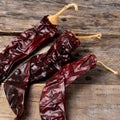 Mexican dried guajillo pepper on wooden background Royalty Free Stock Photo