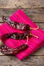 Mexican dried guajillo pepper on wooden background Royalty Free Stock Photo