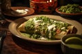 Traditional Mexican enchiladas on wooden table. Royalty Free Stock Photo